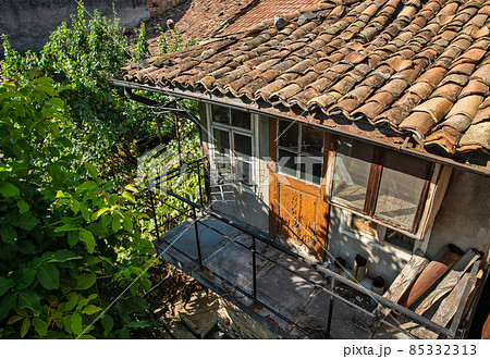 Old abandoned residential house in Veliko Tarnovo in Bulgaria. Old abandoned residential house in Veliko Tarnovo in Bulgaria. 85332313