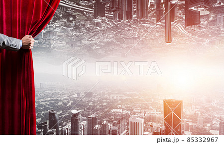 Modern business reflected cityscape behind curtain opened by businessman hand 85332967
