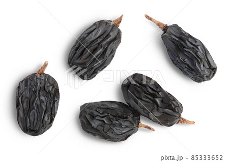 Black raisin isolated on white background with clipping path. Top view. Flat lay Black raisin isolated on white background with clipping path. Top view. Flat lay 85333652