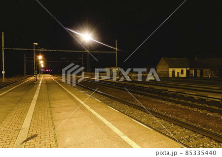 Railway station at the night. European railway station. Railway station at the night. European railway station. 85335440