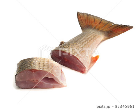 Pieces of red-finned mullet isolated on a white background 85345961