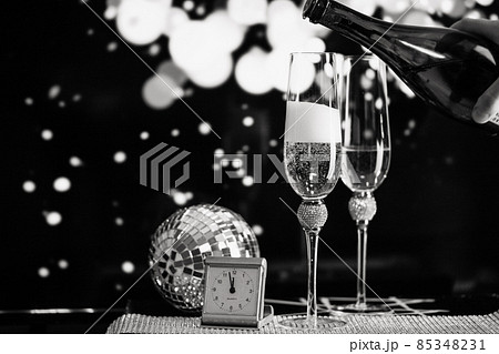 happy New Year champagne glasses and fireworks celebration background 85348231
