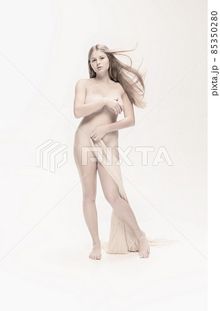 Portrait of young beautiful girl in character of famous classical artwork posing in veil isolated over white bacground 85350280