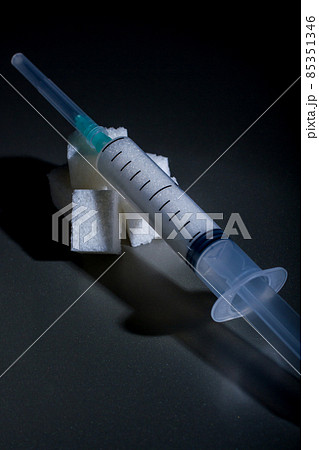 a syringe with sugar a syringe with sugar 85351346