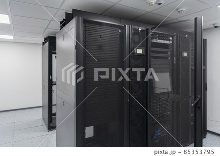 Data Center With Multiple Rows of Fully Operational Server Racks. Modern Telecommunications, Cloud Computing, Artificial Intelligence, Database, Supercomputer Technology Concept. 85353795