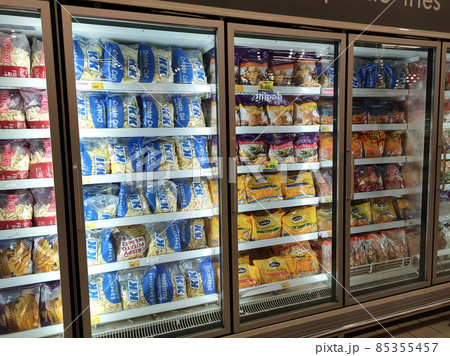 JOHOR, MALAYSIA - MARCH 3, 2021: Selected focused on french fries in commercially branded packaging and sold in supermarkets. Place in the chiller to ensure freshness. Tagged with the price tag.  85355457