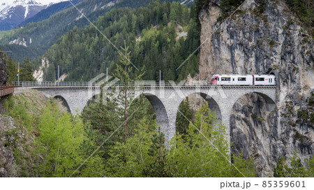 Glacier train on landwasser Viaduct bridge, Switzerland 85359601