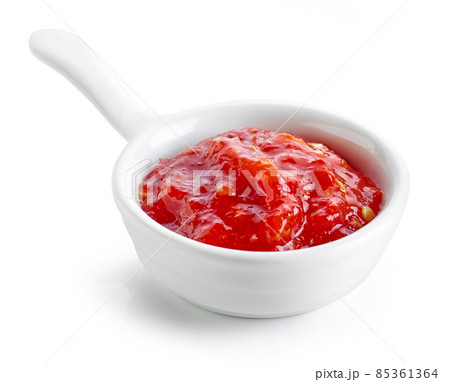 bowl of red hot chili pepper sauce 85361364