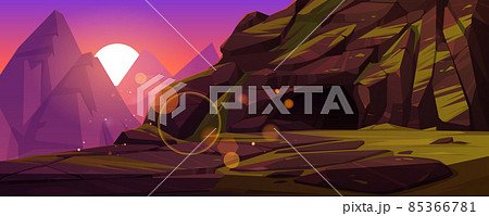 Mountains with entrance to dark cave at sunset 85366781