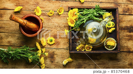 Glass teapot with flower tea,herbalism 85370468