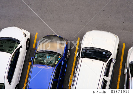 Colorful car parking lot inn modern condo resident aerial view 85371915