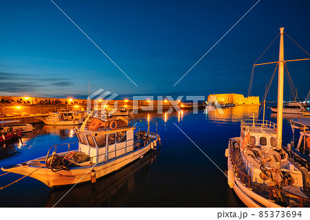 Venetian Fort in Heraklion and moored fishing boats, Crete Island, Greece Venetian Fort in Heraklion and moored fishing boats, Crete Island, Greece 85373694