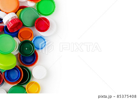 Group of multicolored bottle caps isolated 85375408