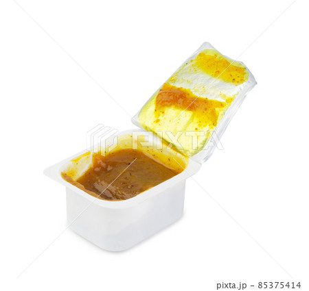 Dip sauce in a plastic take away container isolated Dip sauce in a plastic take away container isolated 85375414