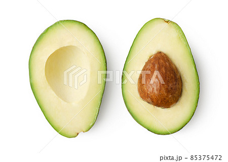 Two slices of avocado isolated Two slices of avocado isolated 85375472