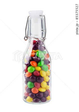 Glass jar full of colorful candies with isolated Glass jar full of colorful candies with isolated 85375527