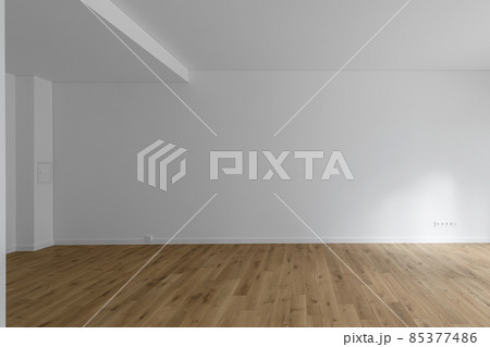 Empty minimalist modern room with white walls and oak wood floor Empty minimalist modern room with white walls and oak wood floor 85377486