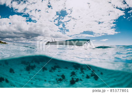 Tropical transparent ocean with white boat in Mauritius. 85377801
