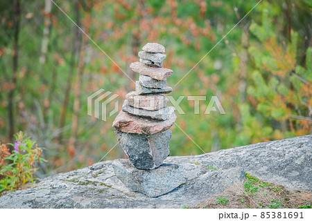 Tower of stones on the edge of the rock. Tower of stones on the edge of the rock. 85381691