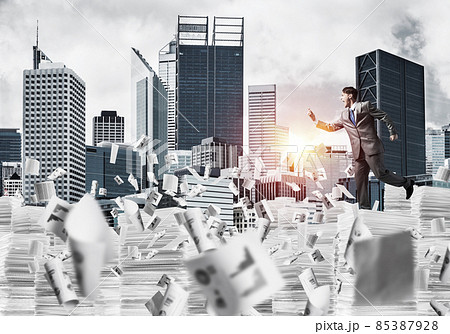 Precise businessman in suit running with phone. 85387928