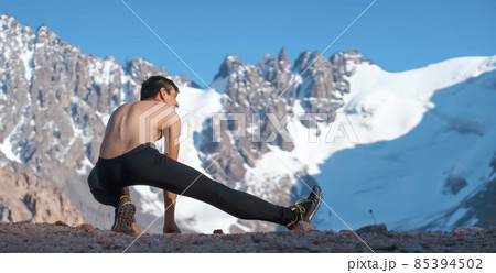 Man is training, running, warming up outdoor. Man is training, running, warming up outdoor. 85394502
