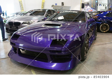 KUALA LUMPUR, MALAYSIA - JUNE 2, 2021: High-performance car being displayed to customers in a large showroom. Some of them have been equipped with racing accessories KUALA LUMPUR, MALAYSIA - JUNE 2, 2021: High-performance car being displayed to customers in a large showroom. Some of them have been equipped with racing accessories 85403904