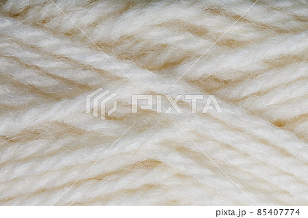 White wool yarn close-up in full screen White wool yarn close-up in full screen 85407774