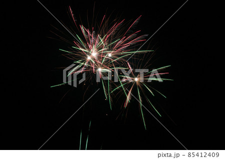Beautiful colorful holiday fireworks on the black sky. 85412409