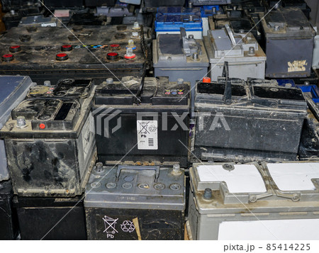 Pallet with many used car batteries for recycling 85414225