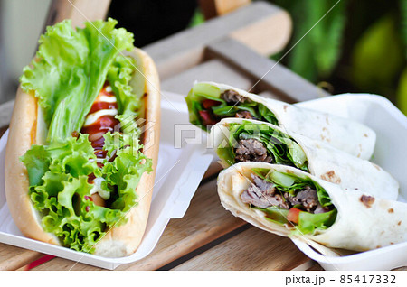 kebab and hot dog ,pork wraps or taco or vegetable roll or mexican rolls kebab and hot dog ,pork wraps or taco or vegetable roll or mexican rolls 85417332