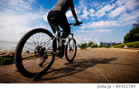 Riding bike on the coast path Riding bike on the coast path 85422784