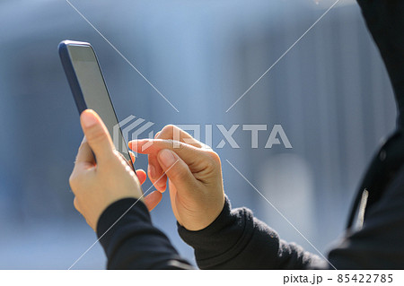 People use smart phone in modern city People use smart phone in modern city 85422785