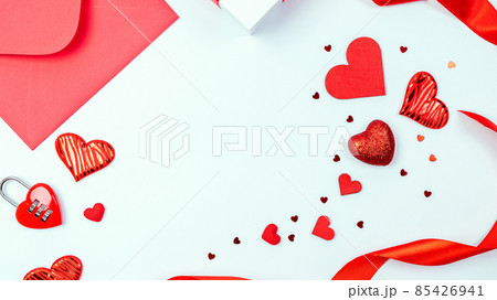 Valentines day heart. Red heart, romantic gift on love white with copy space. Valentine decoration for flat lay background. Valentines day heart. Red heart, romantic gift on love white with copy space. Valentine decoration for flat lay background. 85426941