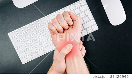 Carpal tunnel syndrome. Hand pain in man injury wrist. Arthritis office syndrome is consequence of computer. Health care and medical concept. Carpal tunnel syndrome. Hand pain in man injury wrist. Arthritis office syndrome is consequence of computer. Health care and medical concept. 85426946