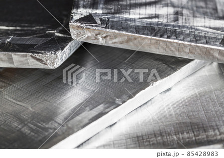 foil-packed chocolate bar made of cocoa and sugar 85428983