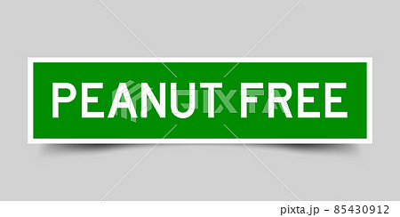 Inserted green color label sticker with word peanut free on gray background 85430912