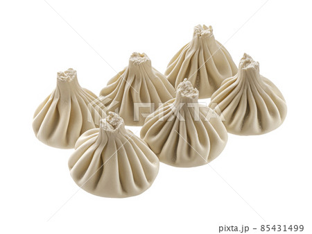 Raw georgian khinkali, frozen dumplings isolated on white background Raw georgian khinkali, frozen dumplings isolated on white background 85431499
