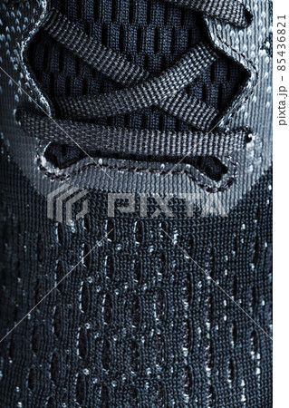 Mesh of black sports sneakers for training Macro 85436821