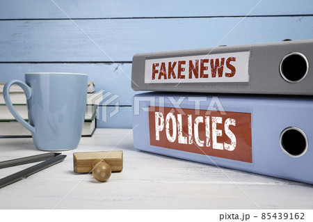 Fake News and Policies concept. Office supplies on a white table 85439162
