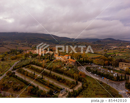 Typical landscape with small villages and farm fields in Tuscany Typical landscape with small villages and farm fields in Tuscany 85442010