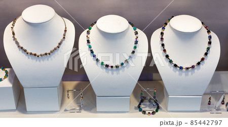 Necklace from natural stones in a jewelry store Necklace from natural stones in a jewelry store 85442797