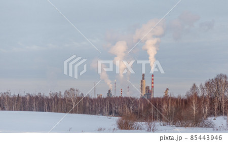 Petrochemical industrial factory of heavy industry, power refinery production with smoke pollution.Thick smoke is coming from the factory's chimney. smoke smog emissions bad ecology aerial photography 85443946
