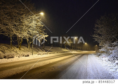 Bad weather driving - foggy hazy country road. Motorway - road traffic. Winter time. 85448317