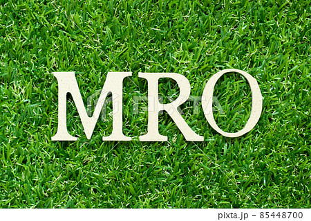 Alphabet letter in word MRO (Abbreviation of Maintenance, repair and overhaul or Maintenance, Repair and Operations) on green grass background 85448700