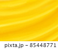 黄色のカーテンが風で波打つイメージの背景素材 85448771