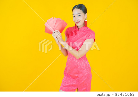 Portrait beautiful young asian woman with red envelope Portrait beautiful young asian woman with red envelope 85451665