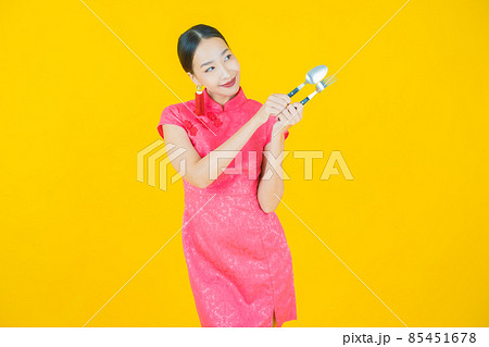 Portrait beautiful young asian woman smile with spoon and fork 85451678