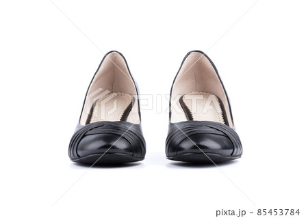 Front view of women's black shoes on a white background. Front view of women's black shoes on a white background. 85453784