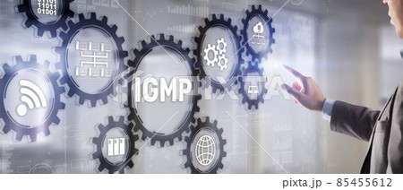 Businessman is pushing his finger on Internet Group Management Protocol. IGMP Businessman is pushing his finger on Internet Group Management Protocol. IGMP 85455612