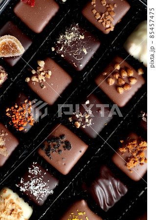 dark, milk and white belgium chocolate candies dark, milk and white belgium chocolate candies 85457475